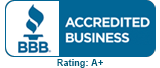 A bbb accredited business seal with an image of trees.